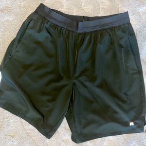Men’s Russell Athletic green athletic shorts.
